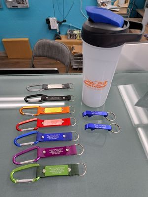 Photo of PAUL 777 AUTO REPAIR - Roseville, CA, US. Current Paul 777 swag given out to first time customers includes the water bottle, colorful keychains, and bottle opener keychain.