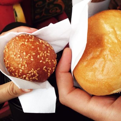 Photo of Victoria BBQ House & Bakery - Victoria, BC, CA. Overly greasy sesame ball and cold pork bun