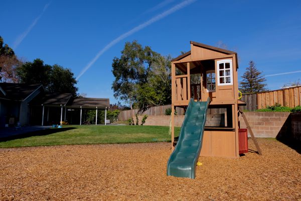 Photo of RB landscaping - Redwood City, CA, US. Backyard remodel including sod installation, paver installation, mulch/kids play area installation.