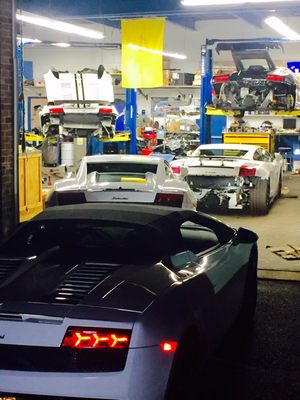 Photo of m- chanics - Mineola, NY, US. This shop must be doing something right. Check out these cars!