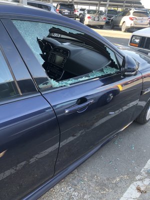 Photo of Fasttrack Parking - Oakland, CA, US. Shattered window.