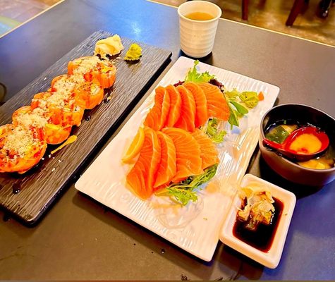 Photo of Hon Sushi - Burnaby, BC, CA. a plate of sushi and a bowl of sauce