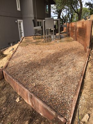 Photo of Yardwork Landscaping - Mill Valley, CA, US. Spreading the 1/8 mixed river rocks