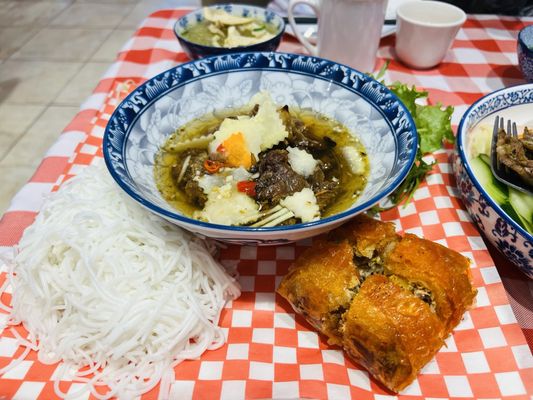 Photo of Crab Hot Lau - Vancouver, BC, CA. Crab spring rolls with noodles