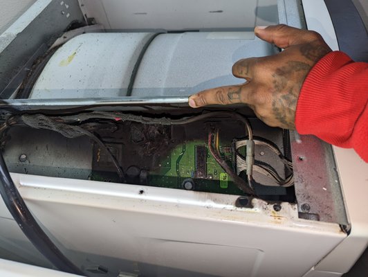 Photo of FixEm Appliance Repair - Lafayette, CA, US. He isn't flipping you the bird but if you look to the left you can see how a lint fire could have been a lot more catastrophic