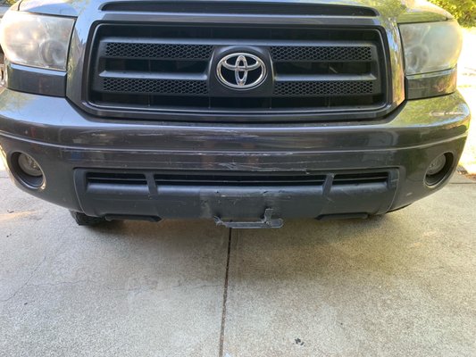 Photo of Airpark - Oakland, CA, US. front bumper damaged and license plate tore off