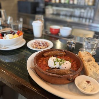 The incredible tagine with merguez, a liège waffle and the equally delicious homemade pistachio cardamom granola with yogurt