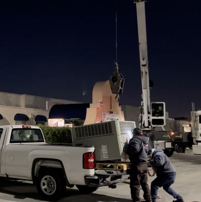 Photo of Phoenix Heating And Air Conditioning - San Leandro, CA, US. Strapping rooftop gas electric unit