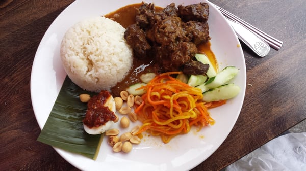 Photo of LoveMama - New York, NY, US. Beef rendang, coconut rice, pickled vegetables, amazing sambal, egg