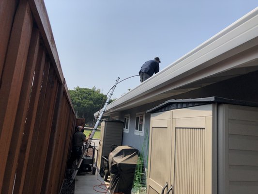 Photo of #1 Honest Plumber - Sunnyvale, CA, US. Feeding the snake to unclog our sewage pipe from top of our roof.