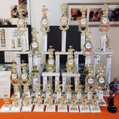 Trophies for our students when they pass their musical ladder tests! It's a unique reward program that can only be found here at Amabile!