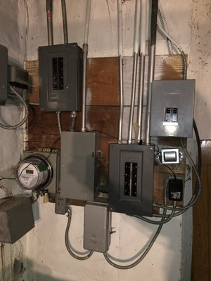 Photo of Mikhail Electrician - New York, NY, US. Old breaker panels removed and combined into one.