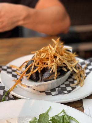 Photo of The Flying Pig - Vancouver, BC, CA. a plate of food on a table