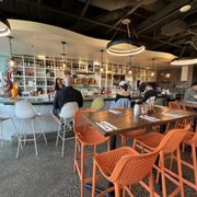 Photo of OEB Breakfast Co. - Yaletown - Vancouver, BC, CA. Interior bar/counter seating area. Make a reservation.