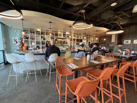 Photo of OEB Breakfast Co. - Yaletown - Vancouver, BC, CA. Interior bar/counter seating area