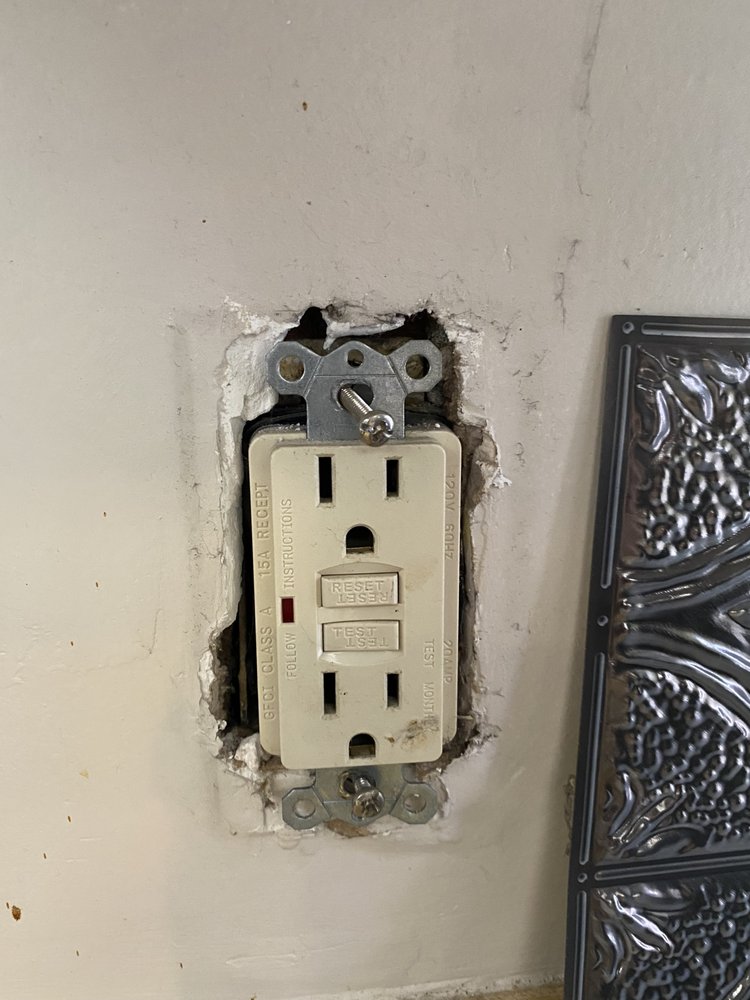 Photo of Electric Heroes - Alameda, CA, United States. Broken outlet with plate removed