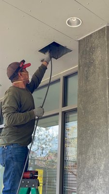 Photo of HVAC Oren's Services - Oakland, CA, US. Tony cleaning the pipes