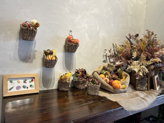 Photo of Joy's Place - San Francisco, CA, US. baskets of fruit and flowers on a table