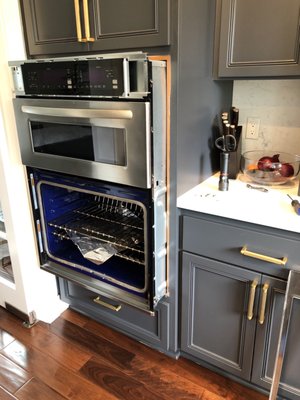 Photo of Spark Appliance Repair - Mountain View, CA, US. Taking the microwave and oven out of the wall with ease and grace!