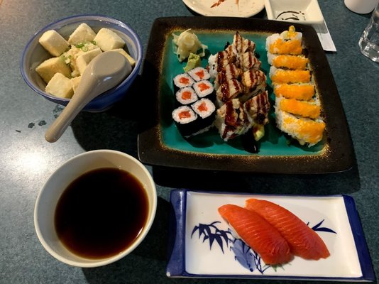 Photo of Sushi at Tough City - Tofino, BC, CA. Agedashi tofu, salmon roll, unagi roll, dynamite roll and sake nigiri.