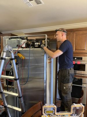 Photo of WAVE Appliance & HVAC Repair - Walnut Creek, CA, US. Servicing a build in refrigerator for our customer