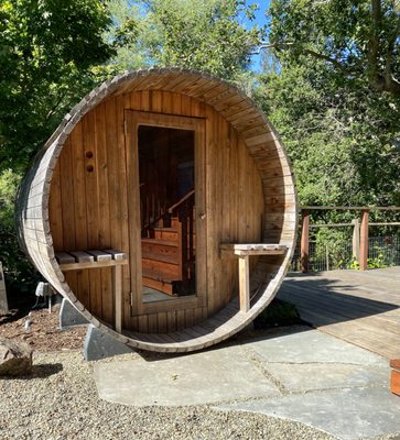 Photo of Terra Gardens - Berkeley, CA, US. a wooden sauna with stairs leading up to it