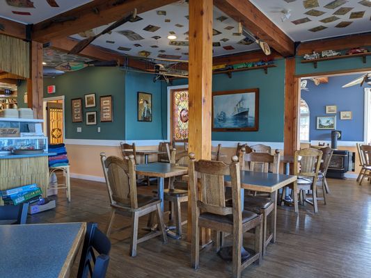 Photo of Sushi at Tough City - Tofino, BC, CA. a restaurant with tables and chairs