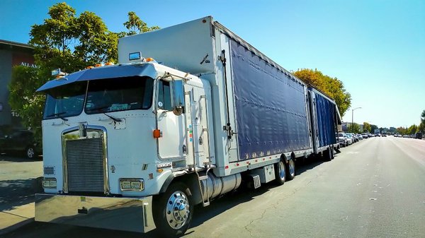 Photo of moveauto - Burlingame, CA, US. Soft side enclosed cabover car hauler