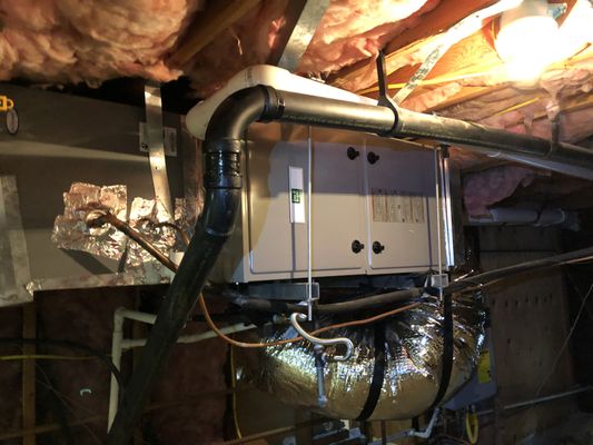 Photo of Phoenix Heating And Air Conditioning - San Leandro, CA, US. Central air furnace and AC install under house with unit the unit suspended