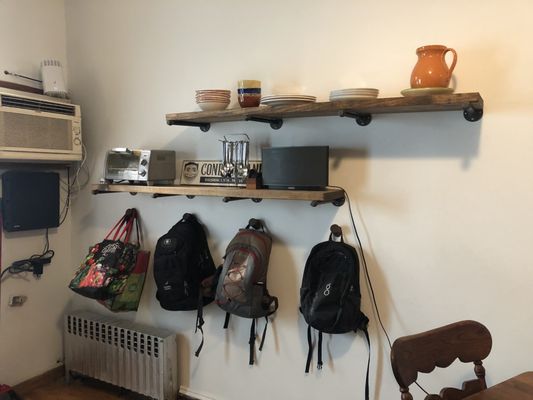 Photo of Wow NYC Handy Men - Brooklyn, NY, US. Hung up the two shelves and their supports, and the 4 hooks. He also mounted our PS (not pictured)