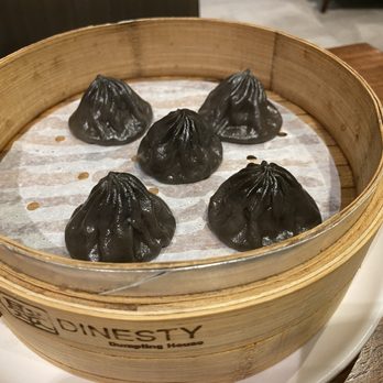 Steamed Black Truffle & Pork Soup Dumplings (ate one before taking the photo)