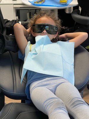 Photo of Mona Mahmoodi, DDS - Park Plaza Dental - Petaluma, CA, US. One very chill 7-year old in the hands of Dr. Mona's staff.