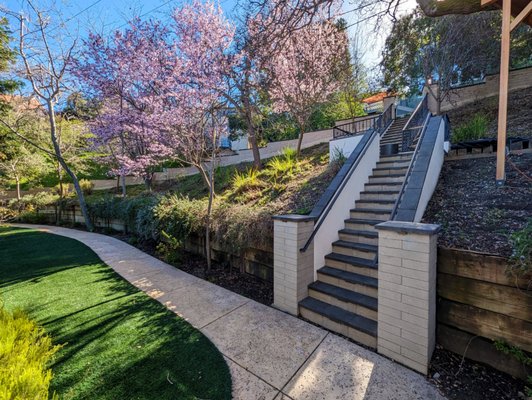 Photo of GCSF Pavers & Landscape - Burlingame, CA, US. Melville Block and cap. Metal railing.