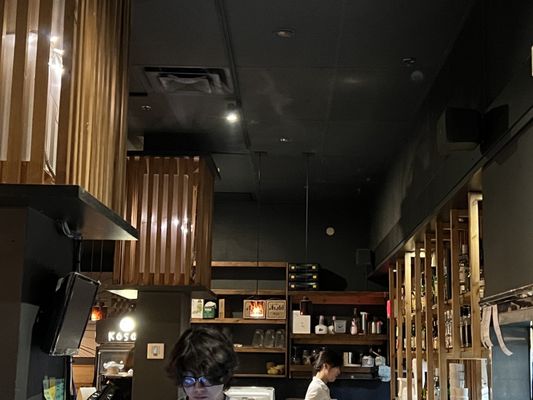 Photo of Kosoo Restaurant - Vancouver, BC, CA. two people working in the kitchen