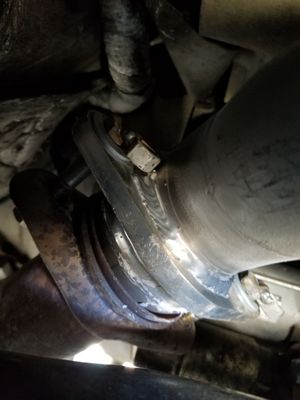 Photo of Golden Auto Muffler & Brake Service - Daly City, CA, US. Extra nuts welded for  no reson on the side