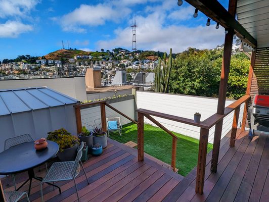 Photo of GCSF Pavers & Landscape - Burlingame, CA, US. Ipe deck, cable railing, artificial turf.