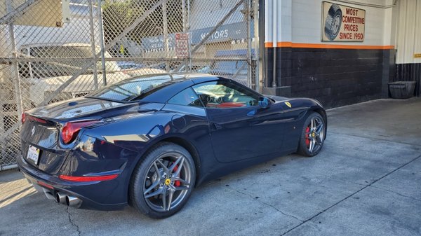 Photo of Larkins Bros Tire Company - San Francisco, CA, US. Ferrari fitted for new shoes