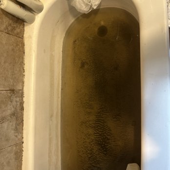 Nasty bathtub backed up - after fixing the problem he cleaner it. Thank you