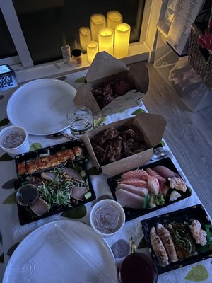 Photo of Hon Sushi - Burnaby, BC, CA. Two kinds of chicken, sashimi sushi combo, aburi salmon nigiri, chopped scallop nigiri, tuna tataki salad. A lot of food for two