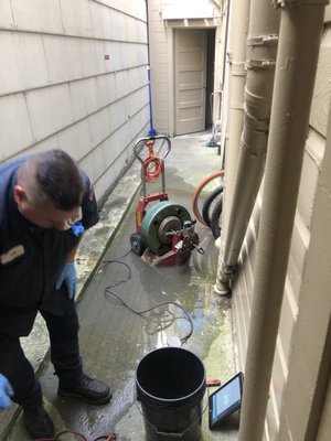 Photo of 24-7 Rooter & Plumbing - San Francisco, CA, US. Standing water with snaking machine. All he needed was a power outlet. Quick and easy