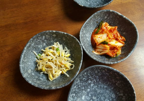 Photo of Han Korean Restaurant - Victoria, BC, CA. three bowls of food on a table