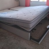 Adjustable bed being disassembled 