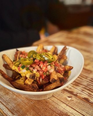 Photo of MeeT - Vancouver, BC, CA. NOT-CHO' AVERAGE NACHO FRIES $13.75