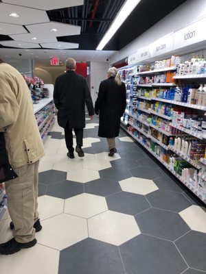 Photo of Duane Reade - New York, NY, US. people shopping in a grocery store