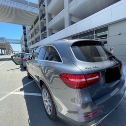 Photo of SFO Long Term Parking - San Francisco, CA, United States. My car IN THE SUN AND ON THE CURB.