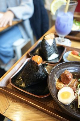 Photo of Takenaka - Vancouver, BC, CA. Soy Marinated Egg Yolk Onigiri (CAD $4)