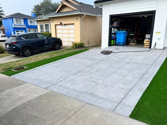 Photo of Green Valley Landscaping Services - San Francisco, CA, US. a driveway with a car in the garage