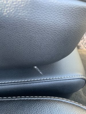 Photo of Ultra Shine Hand Car Wash & Auto Detailing - Vancouver, BC, CA. Front seat. Dirt on leather . Never wiped