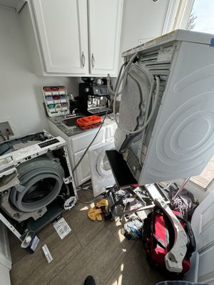 Photo of Natomas Appliance - Sacramento, CA, US. Bosch washer repair in cramped room.
