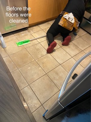 Photo of CLEANY - New Westminster, BC, CA. This is the stained kitchen floor before Cleany cleaned it.